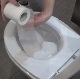 A woman places toilet paper into a toilet bowl and pisses on the toilet paper, soaking it in the process. Presented in 720P HD. Exactly 3.5 minutes.